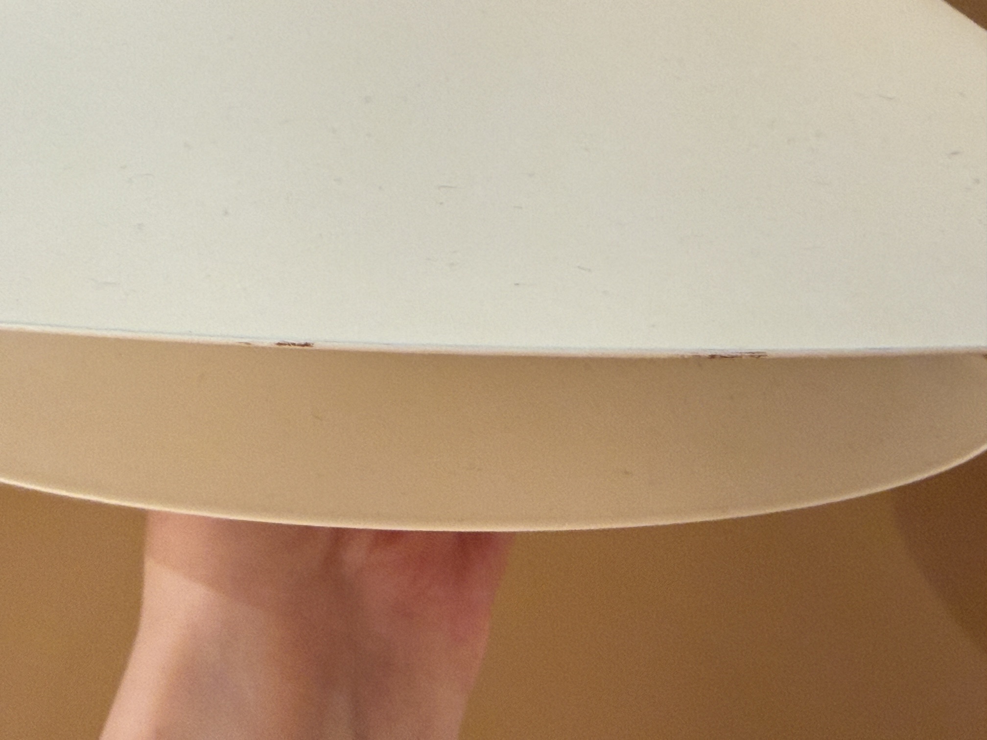 Vintage Scandinavian pendant lamp in cream color with layered design and atmospheric light distribution